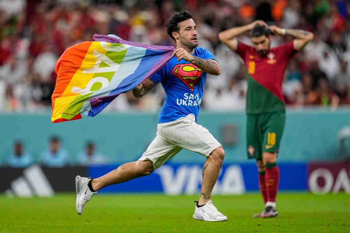 A FAN INVADING WITH A RAINBOW FLAG HALTED PORTUGAL VS URUGUAY IN THE 51ST MINUTE